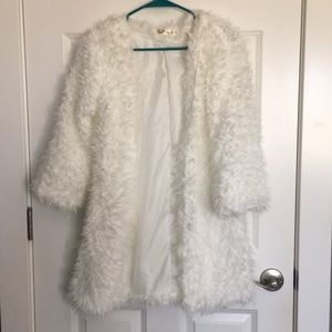 White fuzzy coat